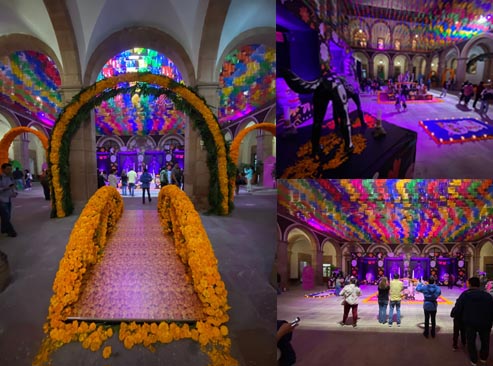 Visitantes admiran el monumental Altar de Muertos de Palacio